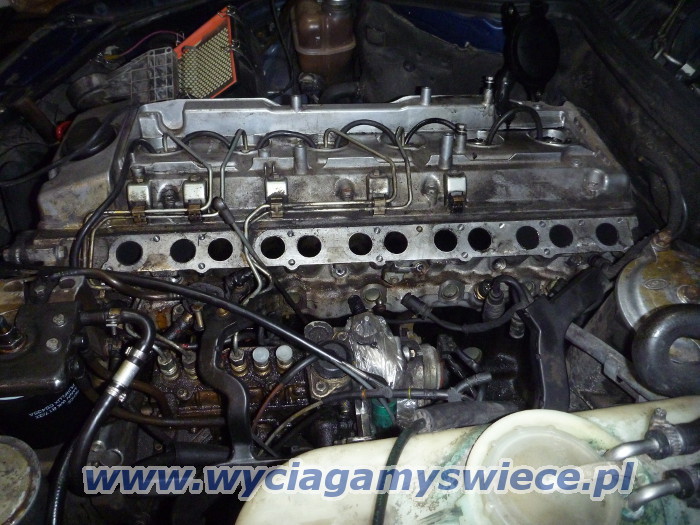 Wyciganie urwanej wiecy
                    arowej z Mercedesa W124